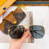 Close-up detail view of Louis Vuitton unisex sunglasses