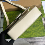 Handle and strap detail of structured everyday-luxe women's handbag – women's designer-style accessory