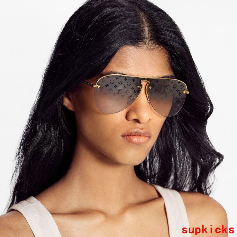 Close-up detail view of Louis Vuitton unisex sunglasses
