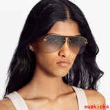 Close-up detail view of Louis Vuitton unisex sunglasses