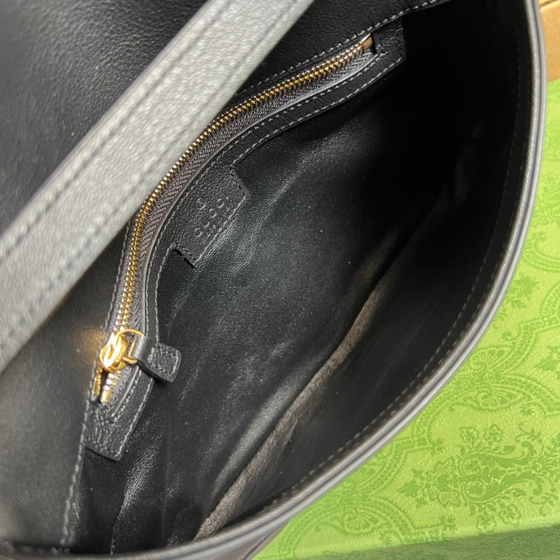 Close-up detail of elevated signature women's handbag – women's designer-style accessory