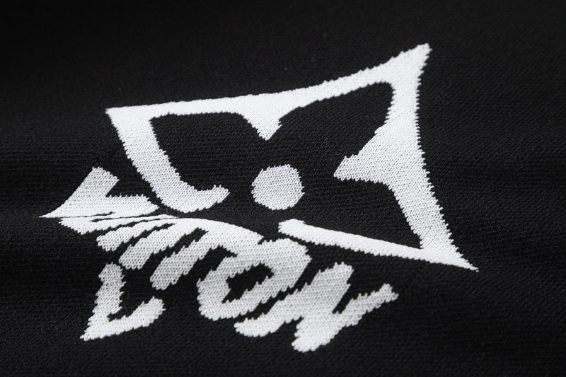 Full styled look of Louis Vuitton luxury clothing with label-forward styling