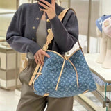  tailored top-handle bag detail view showing craftsmanship