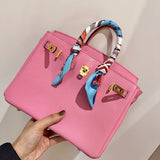 Streamlined handbag styled for everyday wear