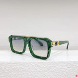 Close-up detail view of Louis Vuitton unisex sunglasses