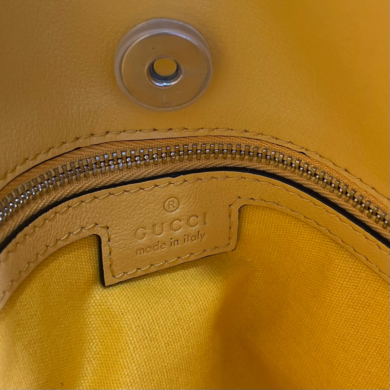 Side profile of classic chic women's handbag – women's luxury handbag