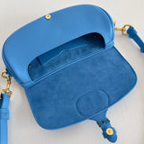 Styled lifestyle shot of premium sleek women's handbag – women's luxury accessory