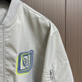 Full styled look of Louis Vuitton luxury clothing with label-forward styling
