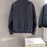 Side profile of Louis Vuitton luxury clothing with signature branding