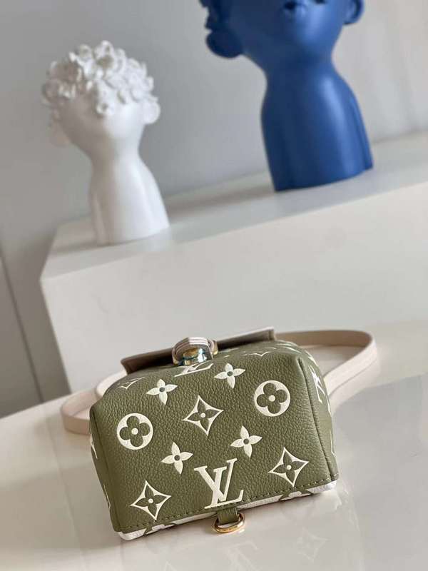 Styled lifestyle shot of signature polished women's handbag – women's premium purse