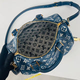 Front view of elevated polished women's handbag – women's statement bag