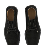 Close-up of Alexander McQueen boots & booties hardware and fine stitching