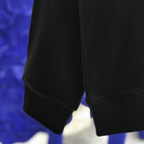 Full styled look of Louis Vuitton luxury clothing with streetwear-inspired cut