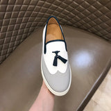 Hermès Red Low-Top Sneakers - Angled View