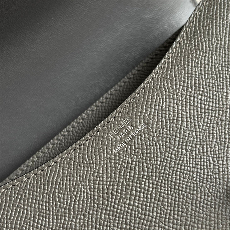 Side view of poised structured handbag