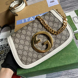 Front view of chic polished women's handbag – women's statement bag