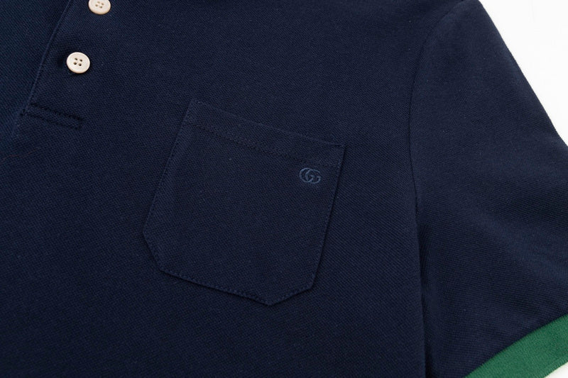 Flat lay presentation of Polo cotton polo shirt with logo-detail design