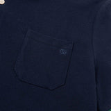 Flat lay presentation of Polo cotton polo shirt with logo-detail design