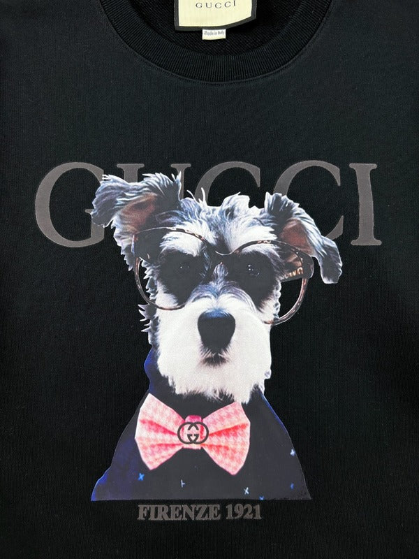 Close-up detail shot of Gucci luxury clothing with signature branding