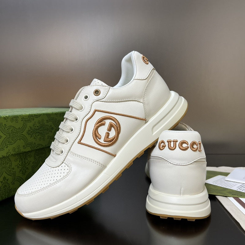 Gucci two-tone luxury sneakers view 5 signature lace-up style