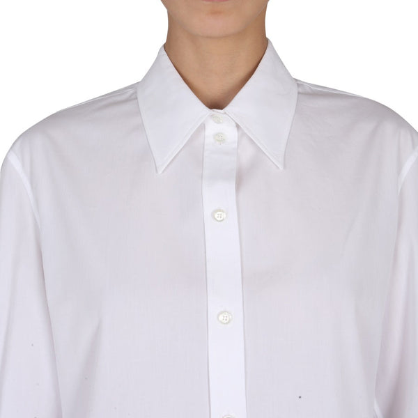 Close-up of Alexander McQueen tee shirts hardware and fine stitching