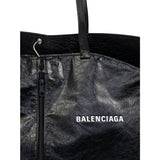 Close-up of Balenciaga totes hardware and fine stitching