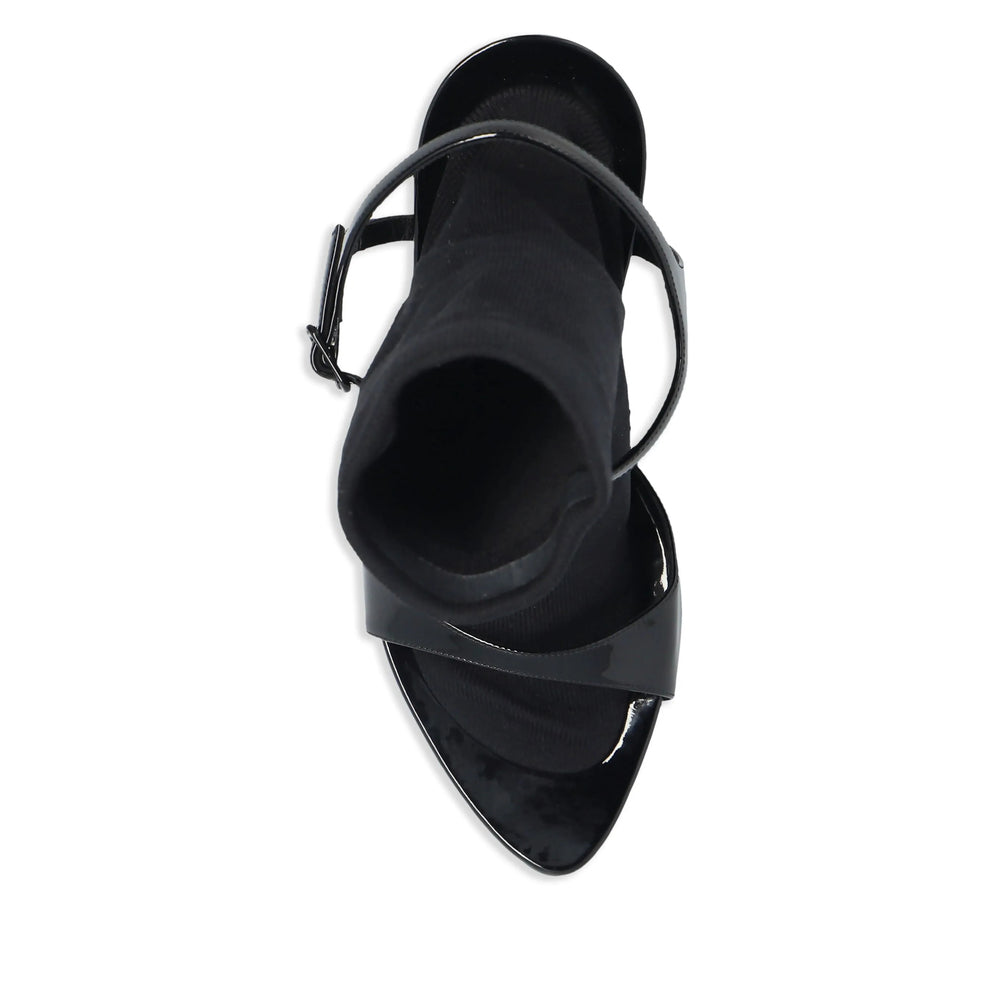 Close-up of Balenciaga sandals hardware and fine stitching