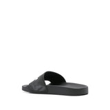 Close-up of Balenciaga sandals hardware and fine stitching