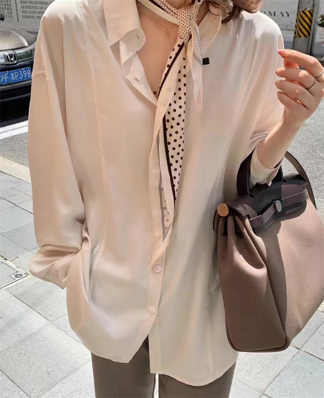 Side view of sculpted structured handbag