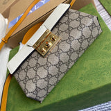 Handle and strap detail of structured everyday-luxe women's handbag – women's statement bag