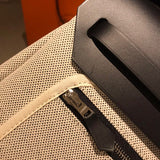 Side view of timeless structured handbag
