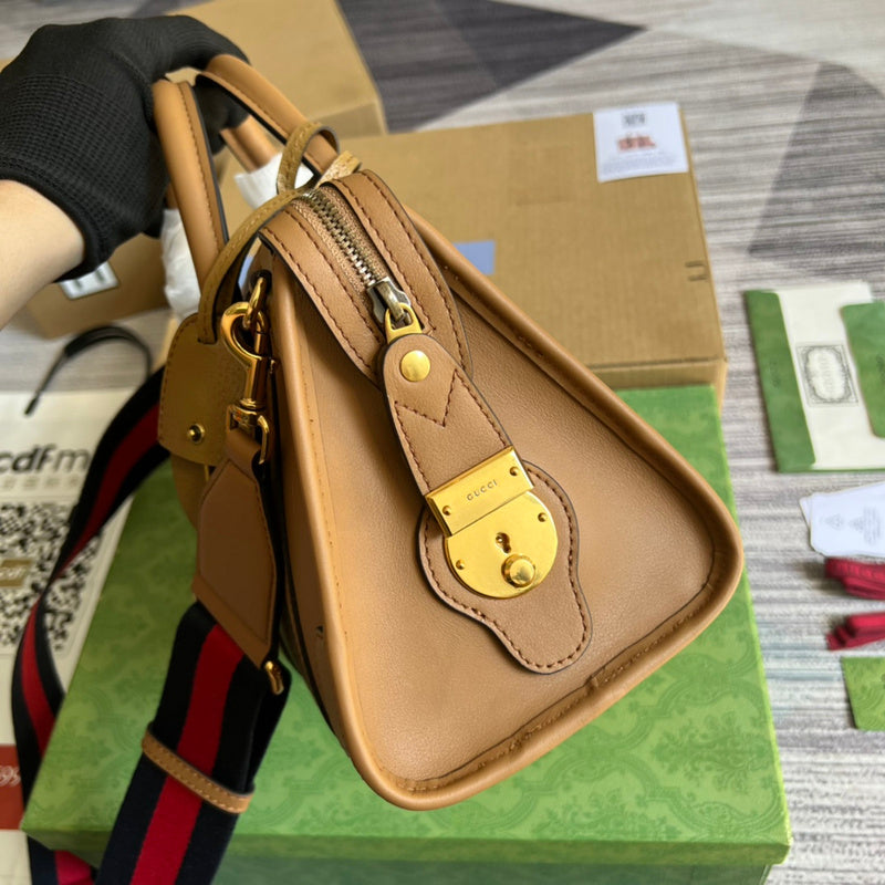 Side profile of structured polished women's handbag – women's everyday handbag