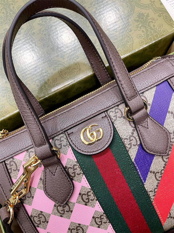 Handle and strap detail of polished structured women's handbag – women's luxury accessory