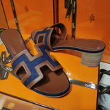 Hermes sandals Style 053 - angled studio shot