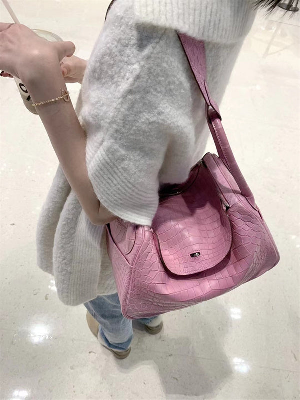  Sleek structured bag carried on shoulder 22