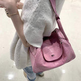  Sleek structured bag carried on shoulder 22