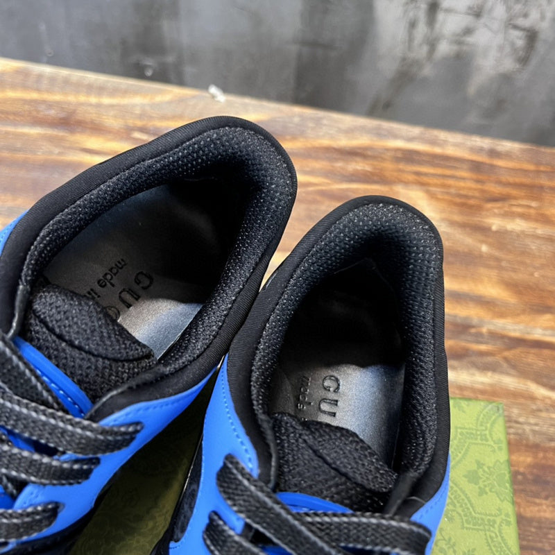 Gucci classic monochrome luxury sneakers view 4 retro runner design