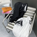 Close-up detail shot of Louis Vuitton luxury clothing with streetwear-inspired cut