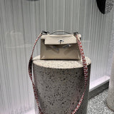 Side view of graceful structured handbag
