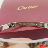 Angled view of Cartier unisex jewelry piece