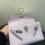 Side view of curated structured handbag