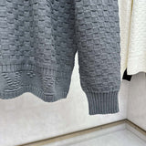 Front view of Louis Vuitton luxury clothing with runway-inspired design