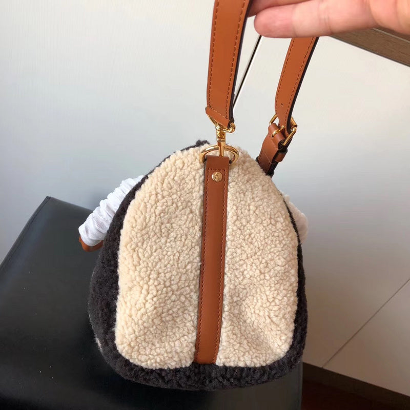 Close-up detail of signature premium women's handbag – women's statement bag