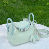  Curated shoulder bag carried on shoulder