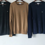 Front view of Lacoste luxury clothing with monogram-inspired silhouette