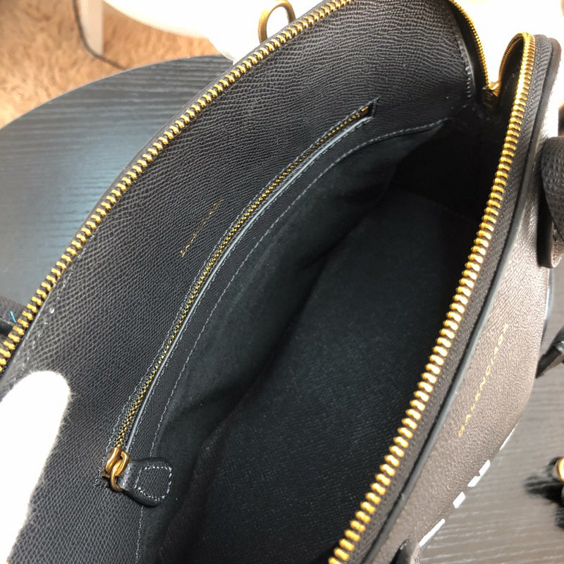 Close-up detail of signature statement women's handbag – women's designer-style accessory