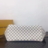 Top view of statement refined women's handbag – women's designer-style accessory