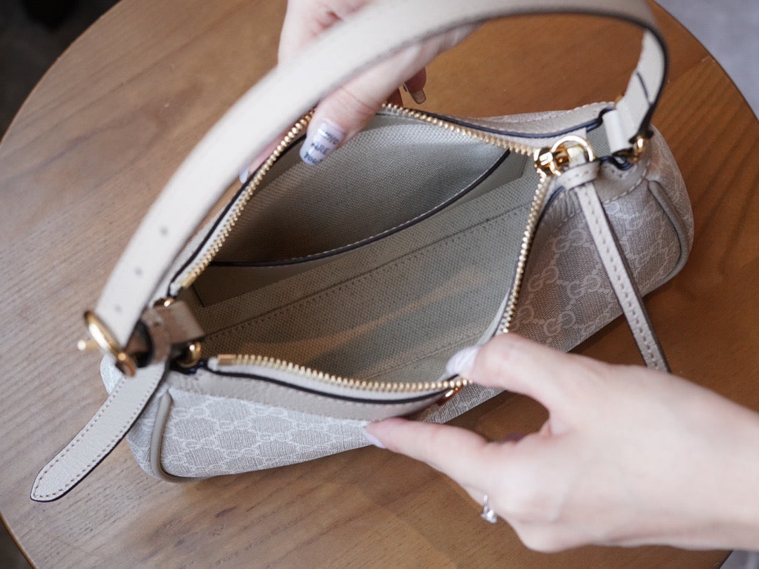 Side profile of Gucci Fashion Item showcasing structured silhouette