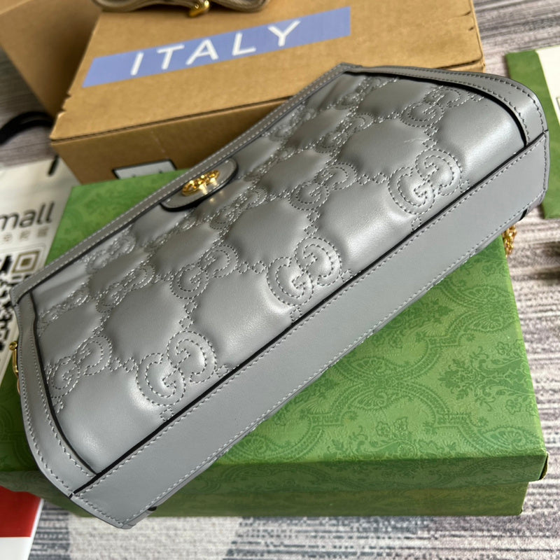 Styled lifestyle shot of modern refined women's handbag – women's luxury handbag