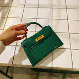 Side view of clean-lined structured handbag